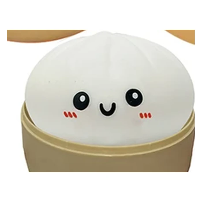 Bao blanc mat aux joues rosées, dans son panier vapeur
